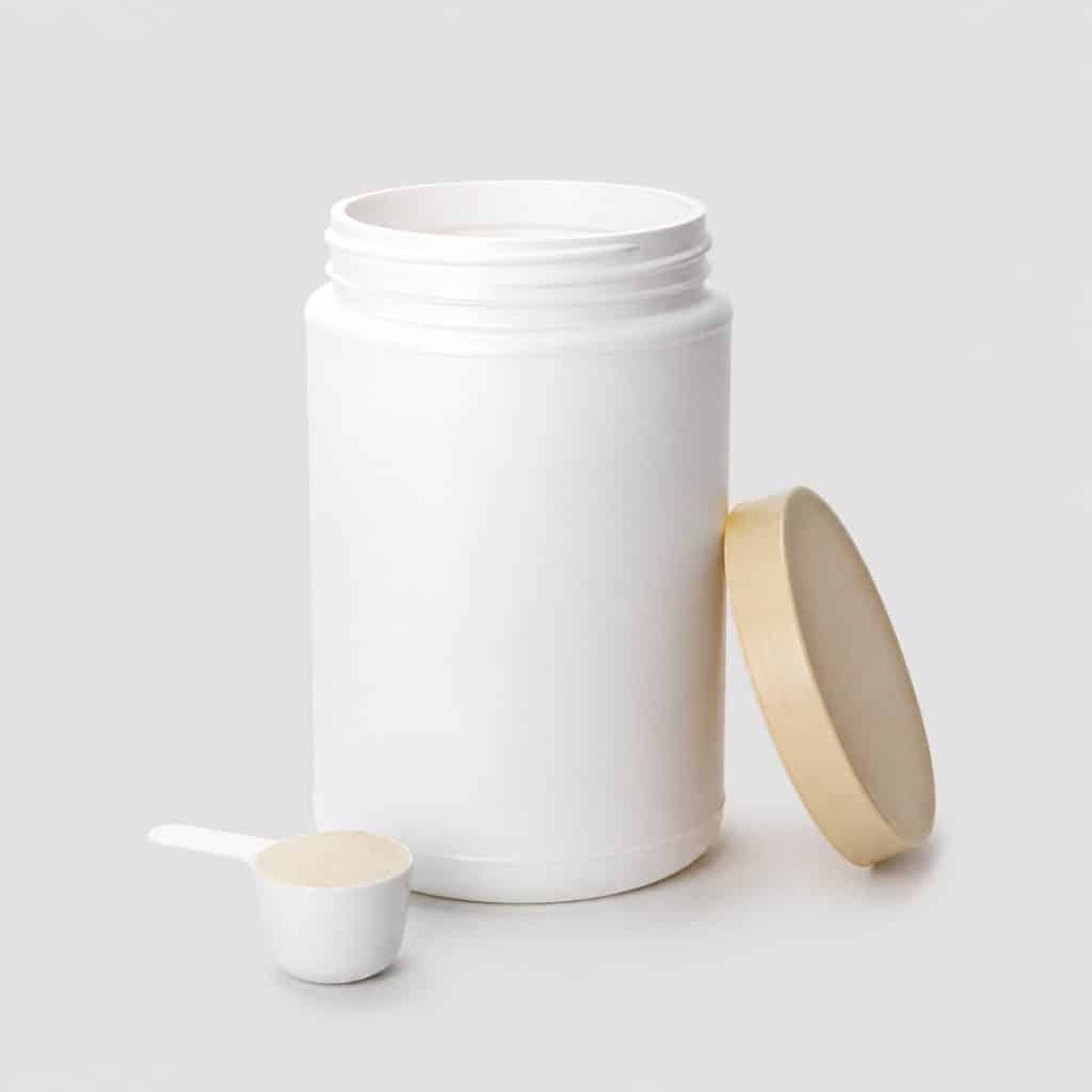 Pot blanc de complément articulaire en poudre pour chien avec sa cuillère doseuse